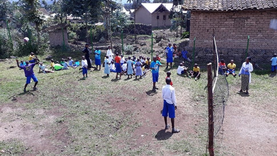 The volleyball court.  The children, and staff, love to play!  But the ground is not good, and when it rains, the pitch becomes impossible to use.